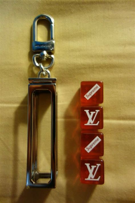 lv supreme keychain
